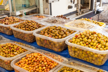 Green and black olives in the oriental market 