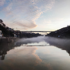 Foggy sunrise at Douro river, Porto
