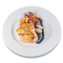 Plate of baked hake with squid in its ink and chives.