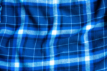 Checkered cloth texture. Squares on textile. Natural fabrics background.