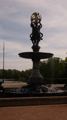 Fototapeta na wymiar Sculpture and fountain Three Graces by Emmanuel Fremiet in Świerklaniecki Park. Ready free entry space.