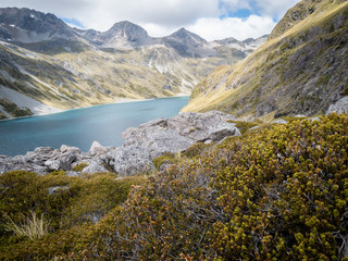 Alpine lake surrounded by mountains, shot at Nelson Lakes National Park, New Zealand