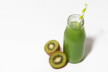 green kiwi juice in a bottle, top view
