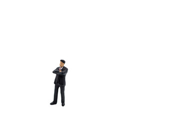 Business Concept. Businessman miniature figure people standing on isolated white background.