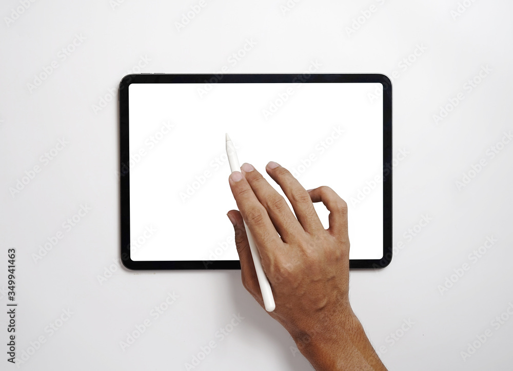 Poster men use digital tablets on desks with blank screens for mock up. a flat lay image of a man holding a