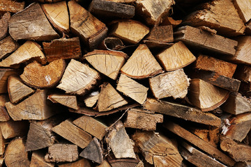Woodpile with firewood. A stack of birch firewood