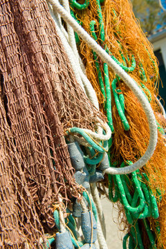 fishing floats and nets.  nets colored yellow and red called pots ideal for lake fishing