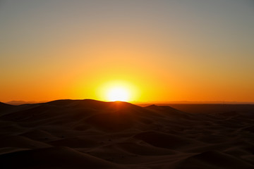 Fototapeta na wymiar Sunset in the Desert. Merzouga Morocco.
