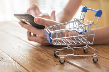 Top view of man using credit card for online shoping