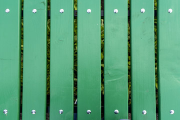 green wooden Park bench background