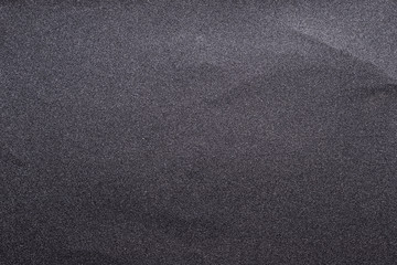 Rough abrasive surface, close-up of sandpaper