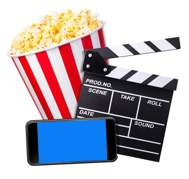 Flying popcorn, film clapper board and phone isolated on white background