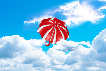rot-weiß gestreifter Regenschirm fliegt aus den Wolken richtung Sonne. 3d rendering