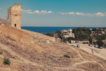 Fototapeta na wymiar Tower of Crisco (part of Genoese fortress, XIV century) in Crimea, Feodosia