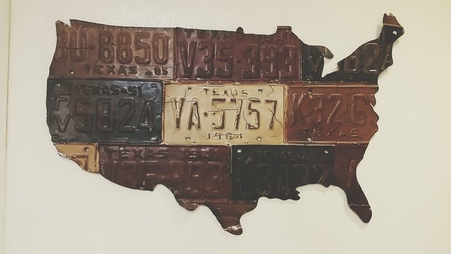 License Plates Carved In Usa Map Mounted On Wall