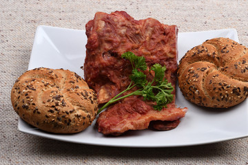 pork smoked ribs with pastry on a plate