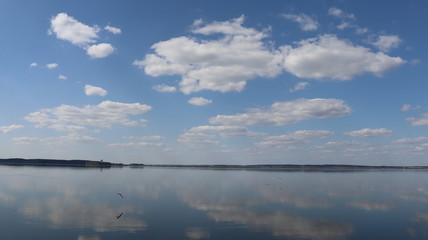 Fototapeta na wymiar sky reflection in lake water
