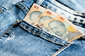 10 lei   on the  back pocket jeans  . Concept of prostitution , bribery or money laundering . Migration connected with trafficking in women and exploitation in Eastern European countries .