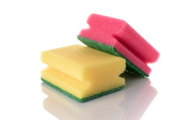Obraz na płótnie Canvas Cleaning sponge isolated on kitchen white background. Household clean equipment background. Supplies for cleaner service.