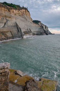 Logas Beach and amazing rocky cliff in Peroulades, Ionian island Corfu, Greece.