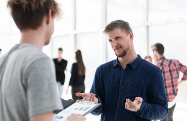 close up. young colleagues discussing business documents