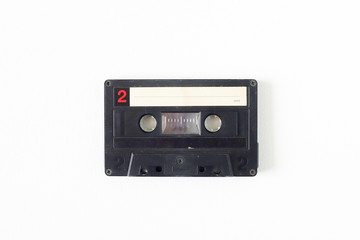 Fototapeta premium Old tape cassette, old or aged wood background. İsolated casette