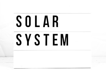 Modern Solar System Sign on Retro Quote Board. Science and Exploration