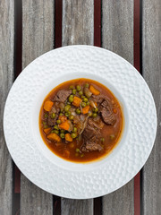 Homemade beef meat roasted with carrots and other veggies - Ragout