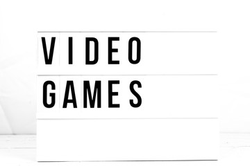 Modern Video Games Sign on Retro Quote Board. Gamer