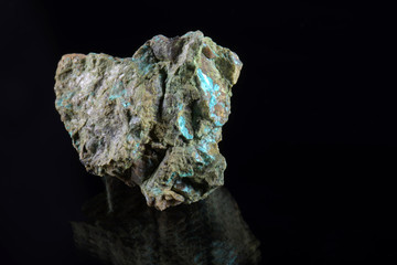 macro shooting of natural mineral stone - green Tirolite