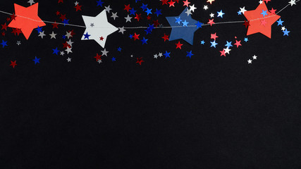 Happy Independence Day banner template, 4th of July celebration concept. Blue red white confetti and stars in USA national colors on black background.