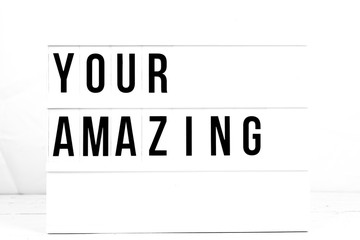 Inspirational Your Amazing quote on vintage retro board. Concept. flat lay