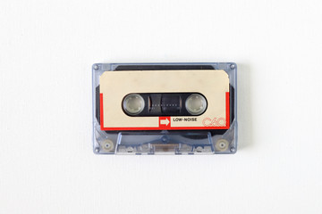 Fototapeta premium Old tape cassette, old or aged wood background. İsolated casette