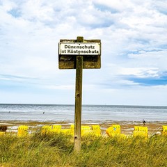 warning sign on the beach