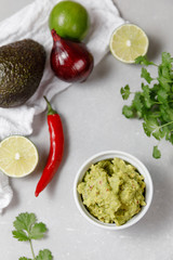 Mexican sauce guacamole with ingredients