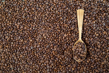 coffee beans on wooden background