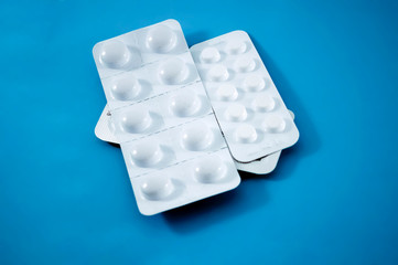 Convolute white pills, vitamins. Pharmacy