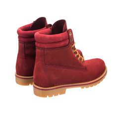 red winter boots made of nubuck isolated on white background
