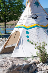 First nations teepee set up in traditional Native American culture.,