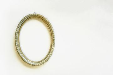 Vintage gold oval frame on white background isolate
