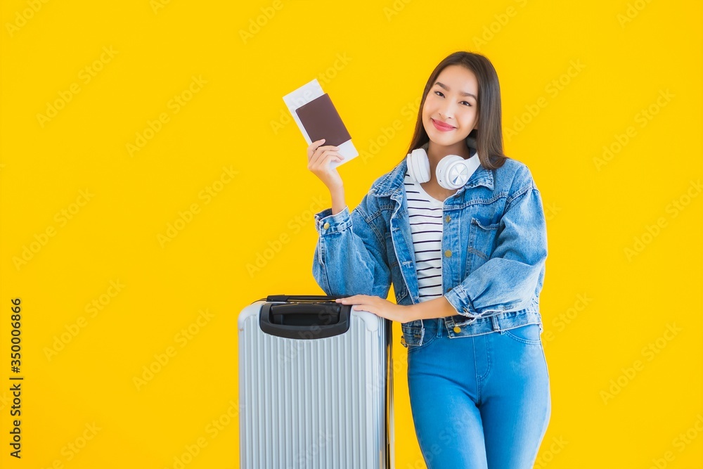 Wall mural portrait beautiful young asian woman travel and leisure with luggage bag and passport