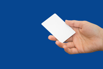 female hand holding bank card with colorful background