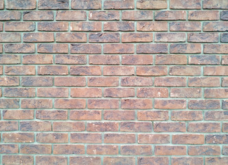Background of red brick, brick wall of a shopping center, texture.