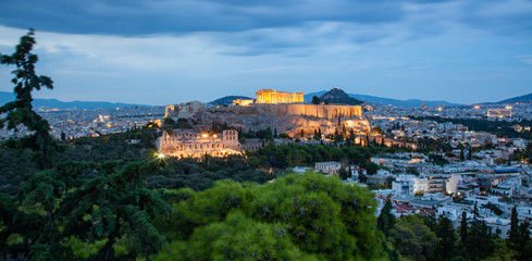 athens seen from Philopapou hill with views to Herodium , Acropolis and the Parthenon at blue hour, Attica, Greece
