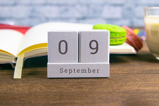 September 9 on the wooden calendar.The ninth day of the autumn month, a calendar for the workplace. Autumn
