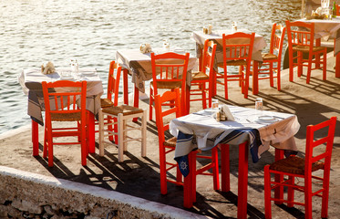 traditional Greek restaurant tables summer holiday concept