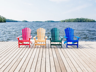 chairs by the lake cottage country