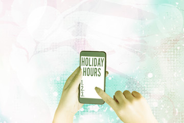 Text sign showing Holiday Hours. Business photo showcasing Overtime work on for employees under...