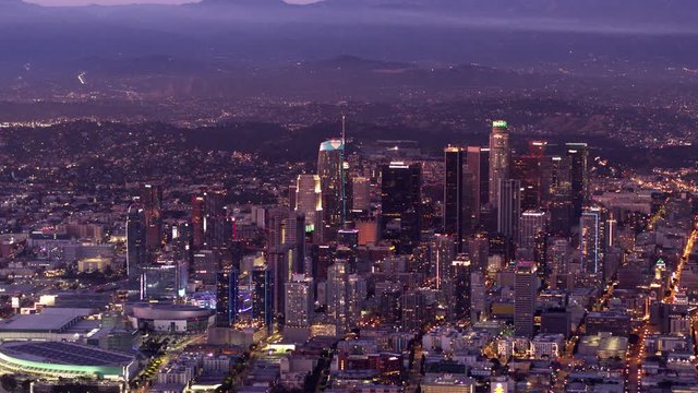 Downtown Los Angeles aerial view, business centre of the city in dawn, sunset in California, mountains in a background of skyscrapers