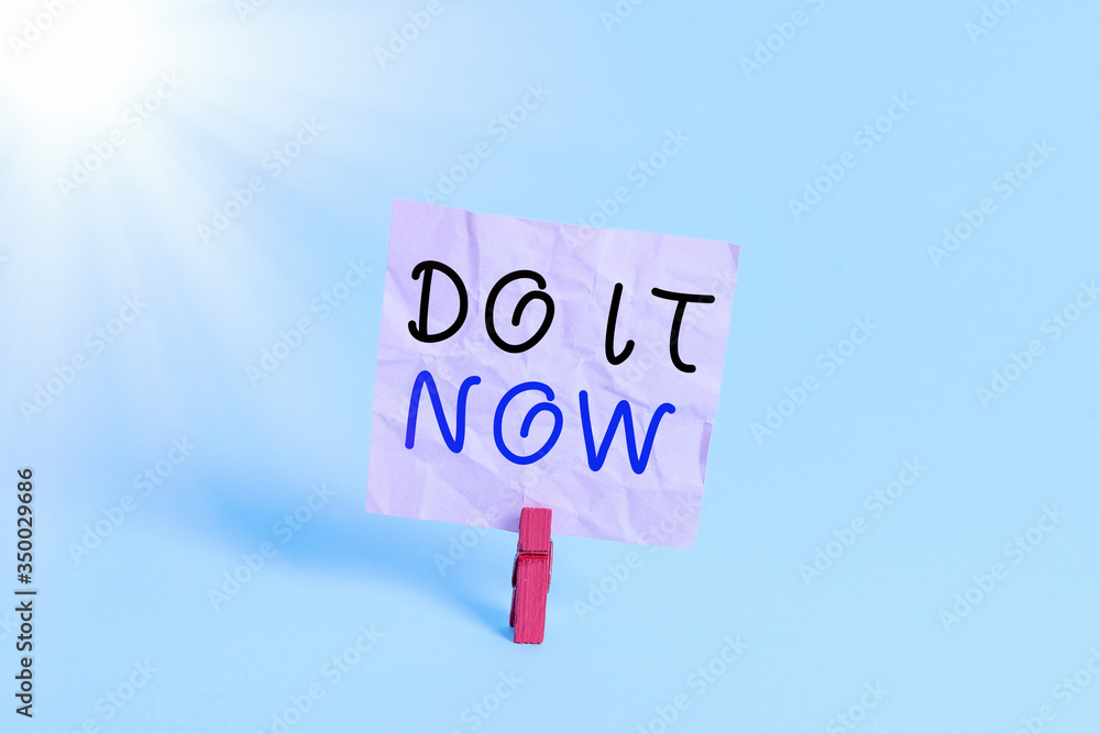 Poster writing note showing do it now. business concept for not hesitate and start working or doing stuff r